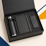 Front view of a black corporate gift box containing a thermal bottle, A5 notebook and wireless power bank.