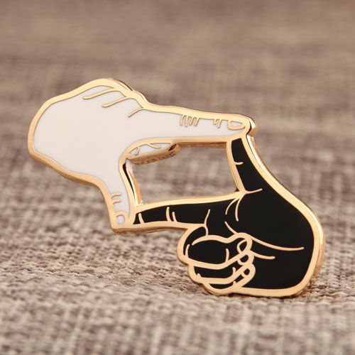 Personalized enamel lapel pin featuring custom artwork, colourful enamel detailing and a smooth polished metal border.