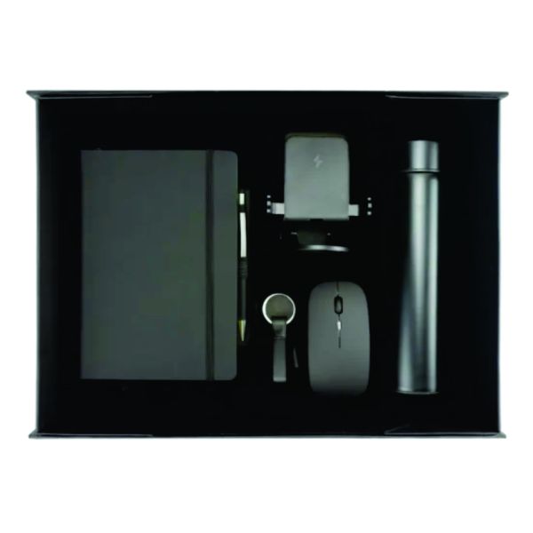Top view of a black executive gift set containing a notebook, pen, wireless charging stand, mouse, keychain and stainless-steel bottle.