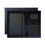 Top view of a dark five-piece executive gift set containing an A5 notebook, metal pen, magnetic card holder, USB keychain and retractable ID cardholder.
