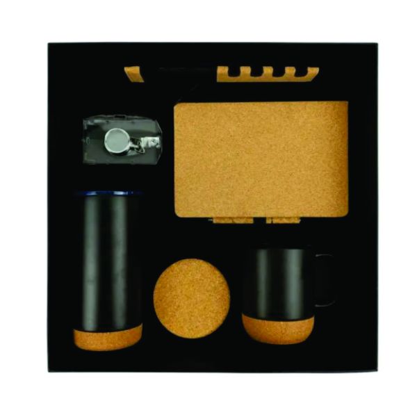Top view of a black-and-cork executive gift set containing a notebook, pen, bottle, mug, coaster and keychain in a fitted presentation box.