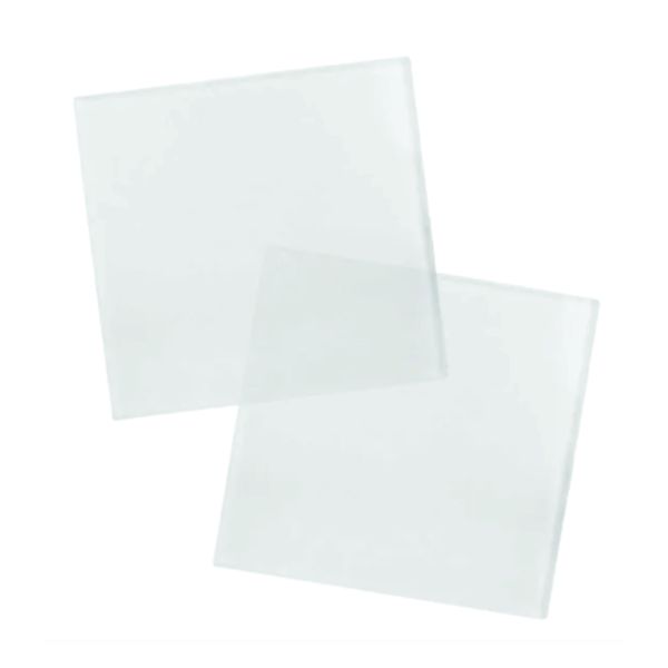 Two plain white square sublimation coasters with softly rounded corners displayed in an overlapping arrangement.