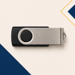 Black USB flash drive with a brushed silver swivel cover