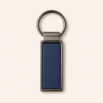 Navy rectangular keychain with a gunmetal frame and circular metal ring.