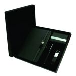 Custom green executive gift set with branded notebook, matching pen, business card holder and USB flash drive keychain inside a presentation box.