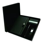Custom green executive gift set with branded notebook, matching pen, business card holder and USB flash drive keychain inside a presentation box.