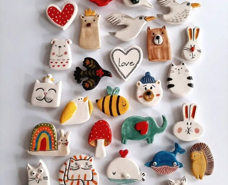 Colourful collection of custom 3D novelty pieces shaped like animals, flowers, hearts and rainbows.